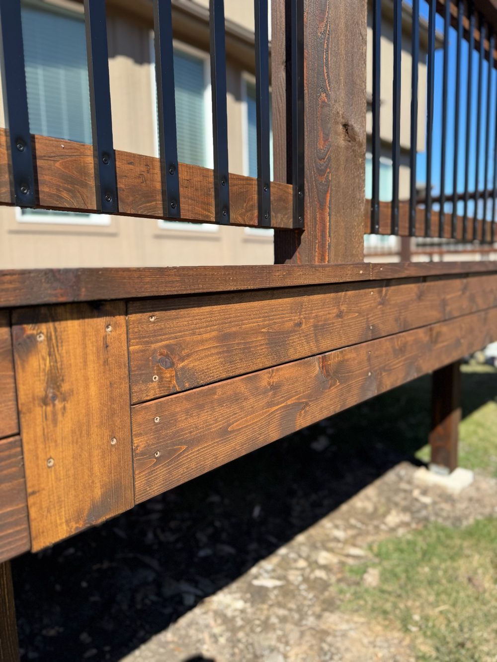Stained deck or fence in Kansas City by Staining Grain