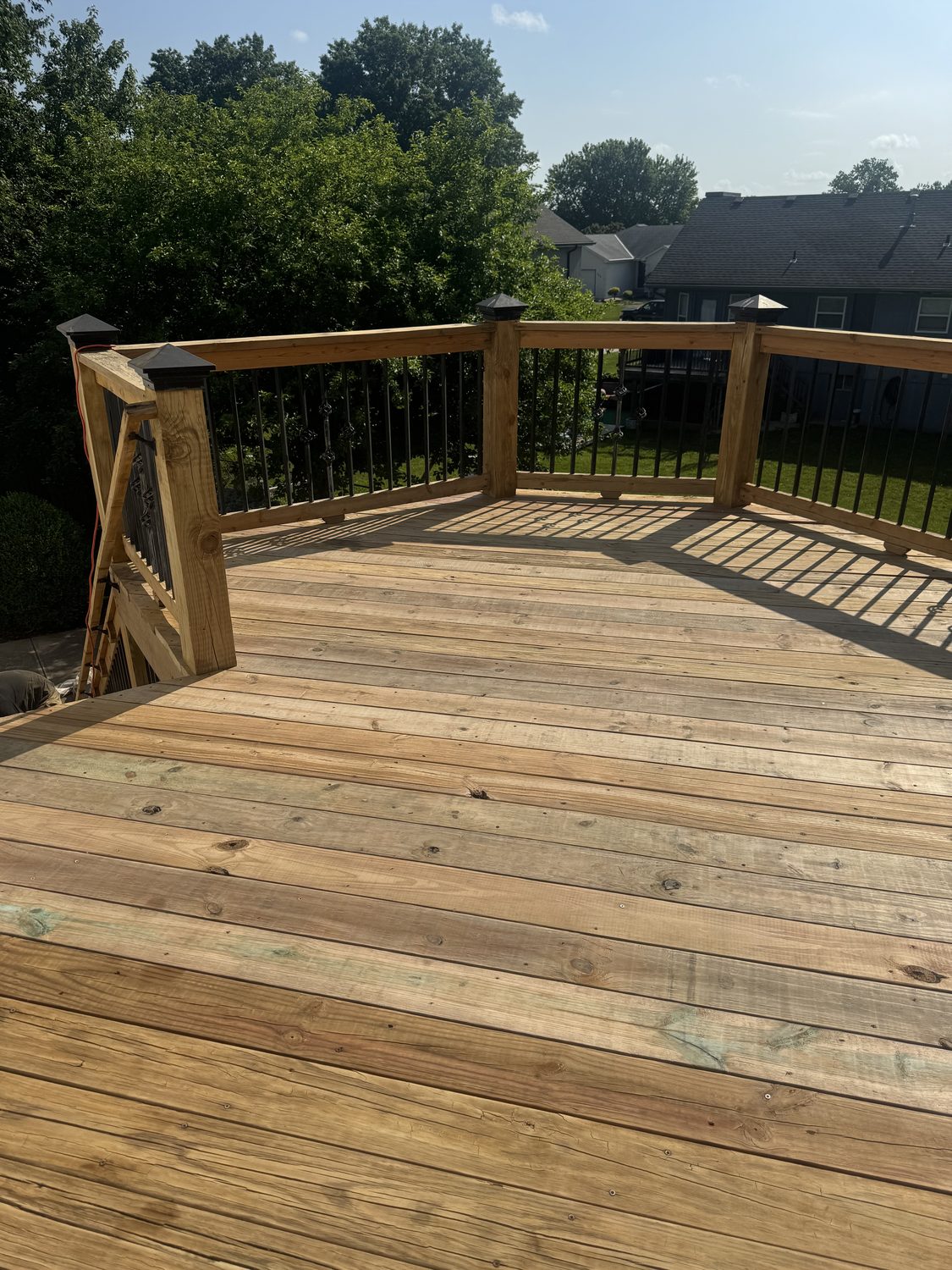 Stained deck or fence in Kansas City by Staining Grain
