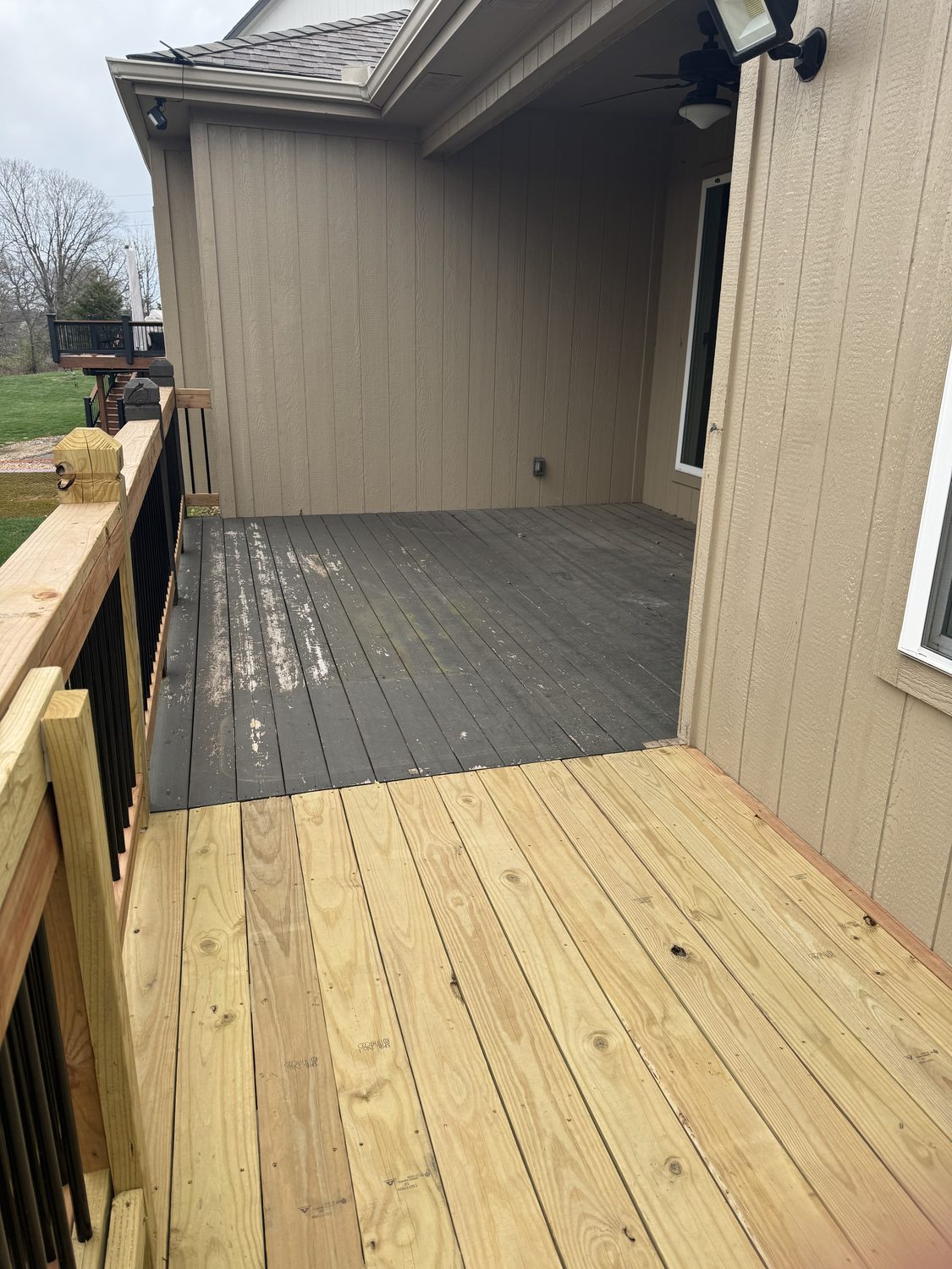 Stained deck or fence in Kansas City by Staining Grain