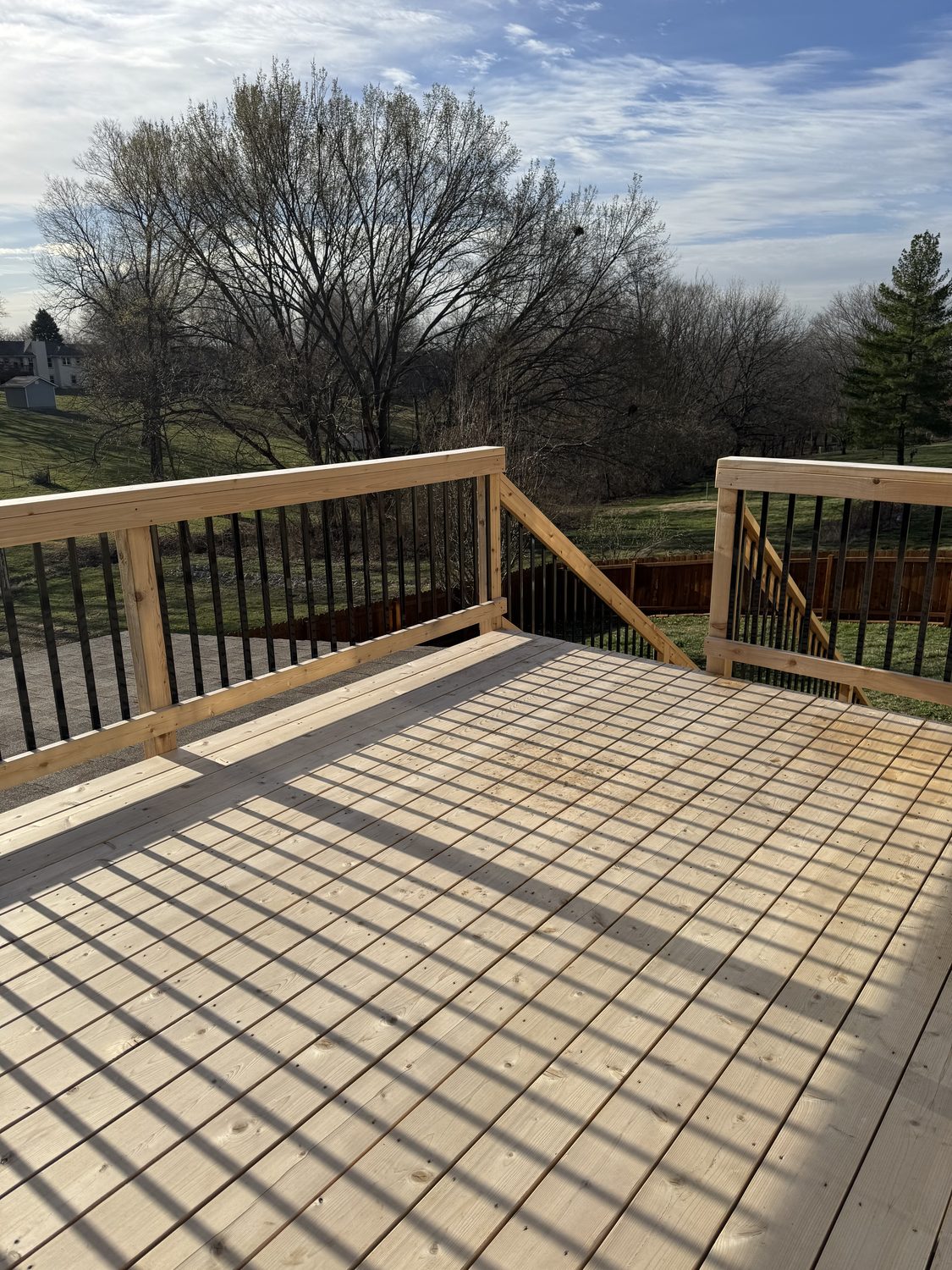 Stained deck or fence in Kansas City by Staining Grain