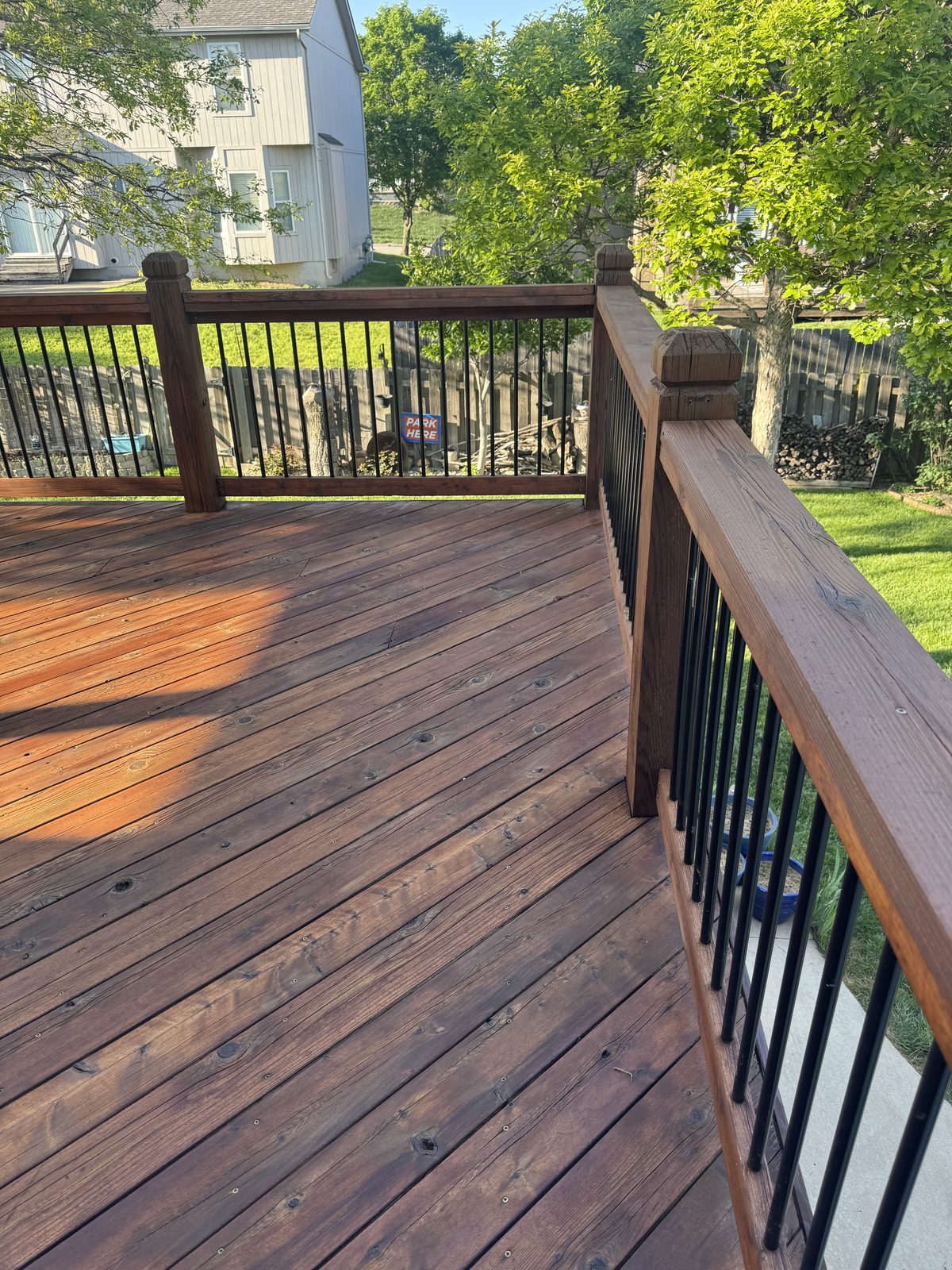 Stained deck or fence in Kansas City by Staining Grain