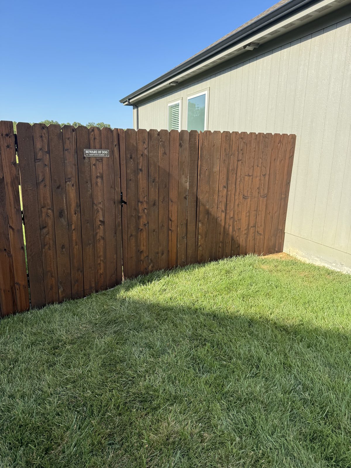 Dog ear fence and gate, dark walnut, fences staining in Kansas City by Staining Grain