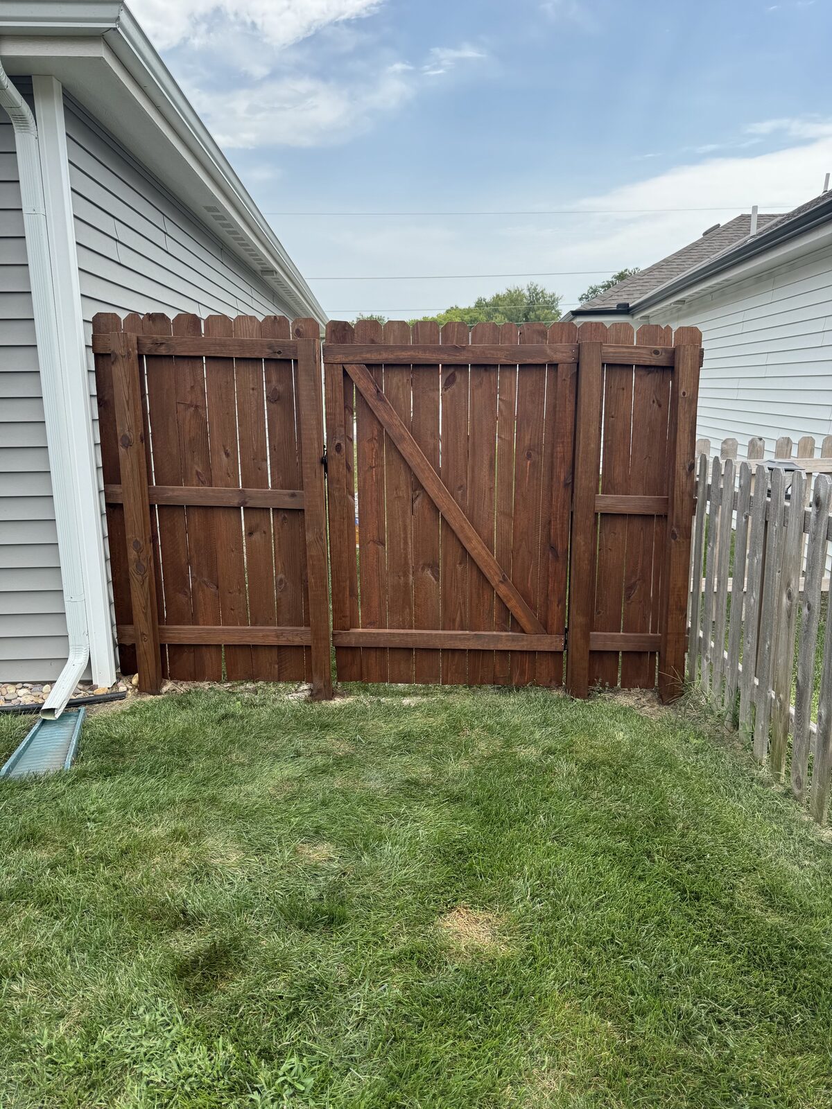 Stained privacy fence and gate