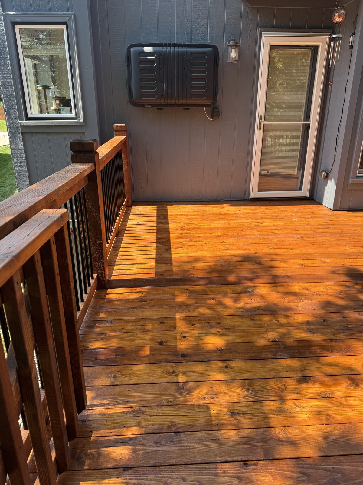 Golden stained deck off the back door